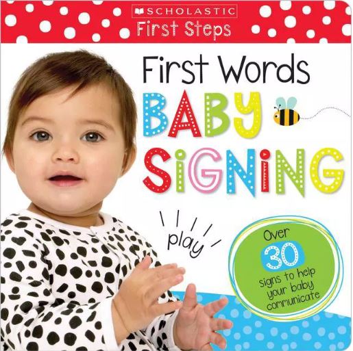 The cover of the book "First Words Baby Signing" features a white background with a smiling baby wearing a white shirt with black polka dots showing the sign for play.