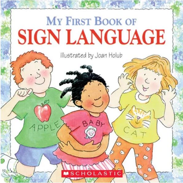The cover of the book "My First Book of Sign Language" features the title at the top on a white background with a blue and green border. Below, an illustrated image of three smilinf children using their hands to make the ASL signs for apple, baby, and cat.