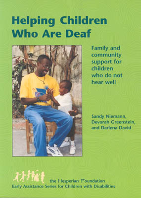 The cover of the book "Helping Children Who Are Deaf: Family and Community Support for Children Who Do Now Hear Well" features a green background with a smiling father sitting in a chair and a smiling little boy standing next to him touching hands.