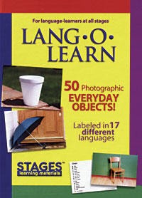 Multi-color box of cards with the text "LANG-O-LEARN Everyday Objects" with additional text indicating there are 50 photographic cards in the box, along with a cup, umbrella, and chair.
