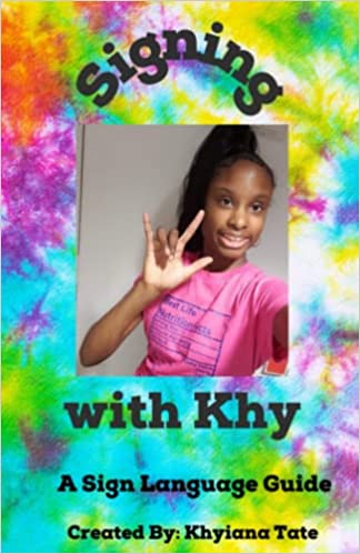 The cover of the book features a tie-dye background with multiple colors and a smiling African American teenage girl wearing a pink shirt shows the "I love you" handshape with her right hand. The title words "Signing" is above and "with Khy: A Sign Language Guide" is below.