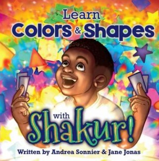 The cover of the book "Shakur" written by Andrea Sonnier and Jane Jonas features an illustrated image of a smiling young African American boy who is looking up and holding two small rectangles in each hand. The background behind the boy is multiple shapes and colors.