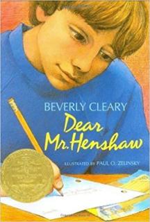 A boy writing a letter