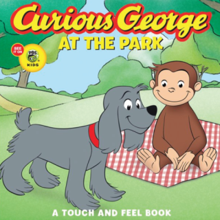 Curious George sitting on a picnic blanket with a dog