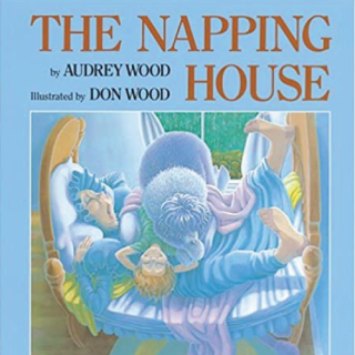 A woman, boy, and dog napping