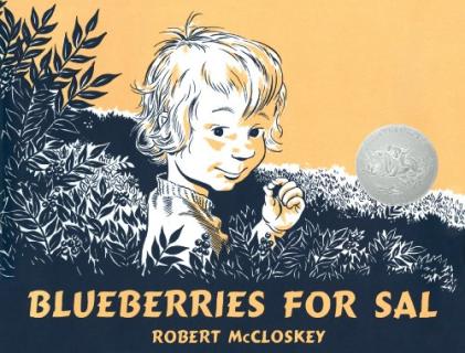 A young child eating blueberries