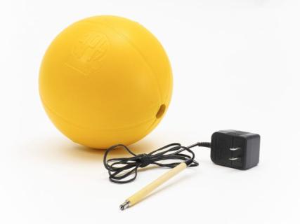 Picture of yellow sound ball with charger.
