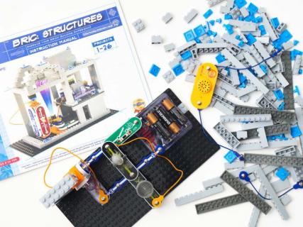 Picture of BRIC Structures instruction manual and kit parts.