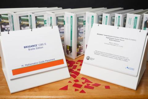 Picture of kit contents. Includes binders and booklets.
