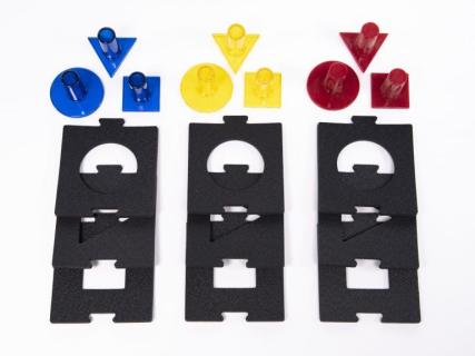 Picture of acrylic shapes with knobs and black foam frames.