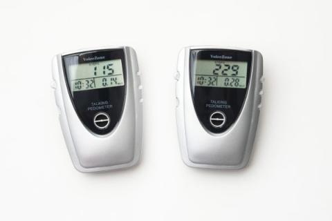 Picture of two talking pedometers. 