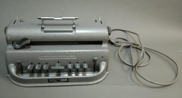 Picture of electric brailler with cord.