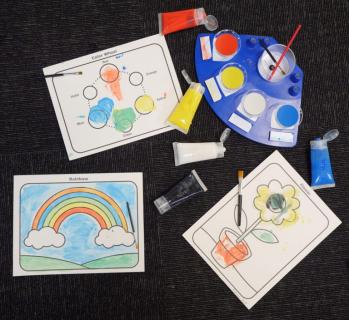 Drawings with paints, palette and brushes.