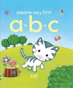 a white and gray kitten plaing with a butterfly